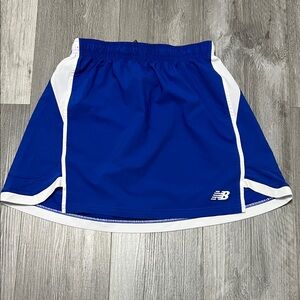 New Balance women’s athletic Skirt/ Royal blue/ size M